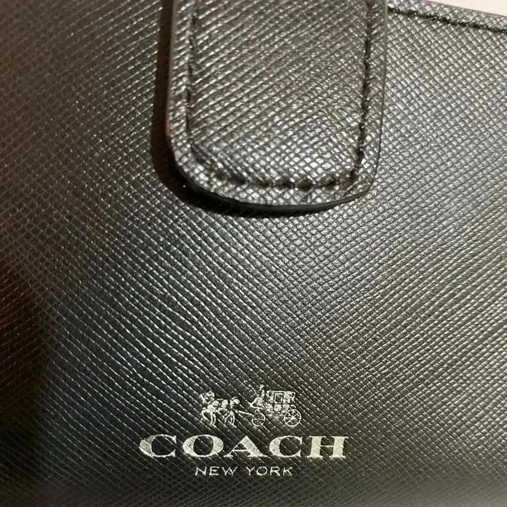 Coach black leather